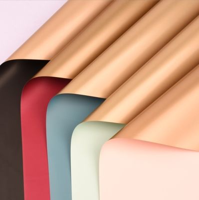 Καλή τιμή. Εταιρική απευθείας πώληση ελαφρής σειράς πολυτελείας διπλής όψεως χρυσού χαρτιού ανθοφόρα υλικά, χαρτί συσκευασίας μπουκέτων κορεατικού τύπου, χαρτί συσκευασίας ανθοπωλείου σε απευθείας σύνδεση